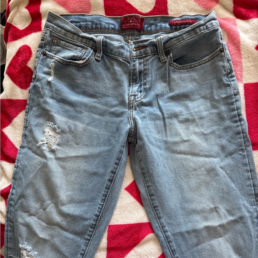 Women's Light Blue Distressed Jeans